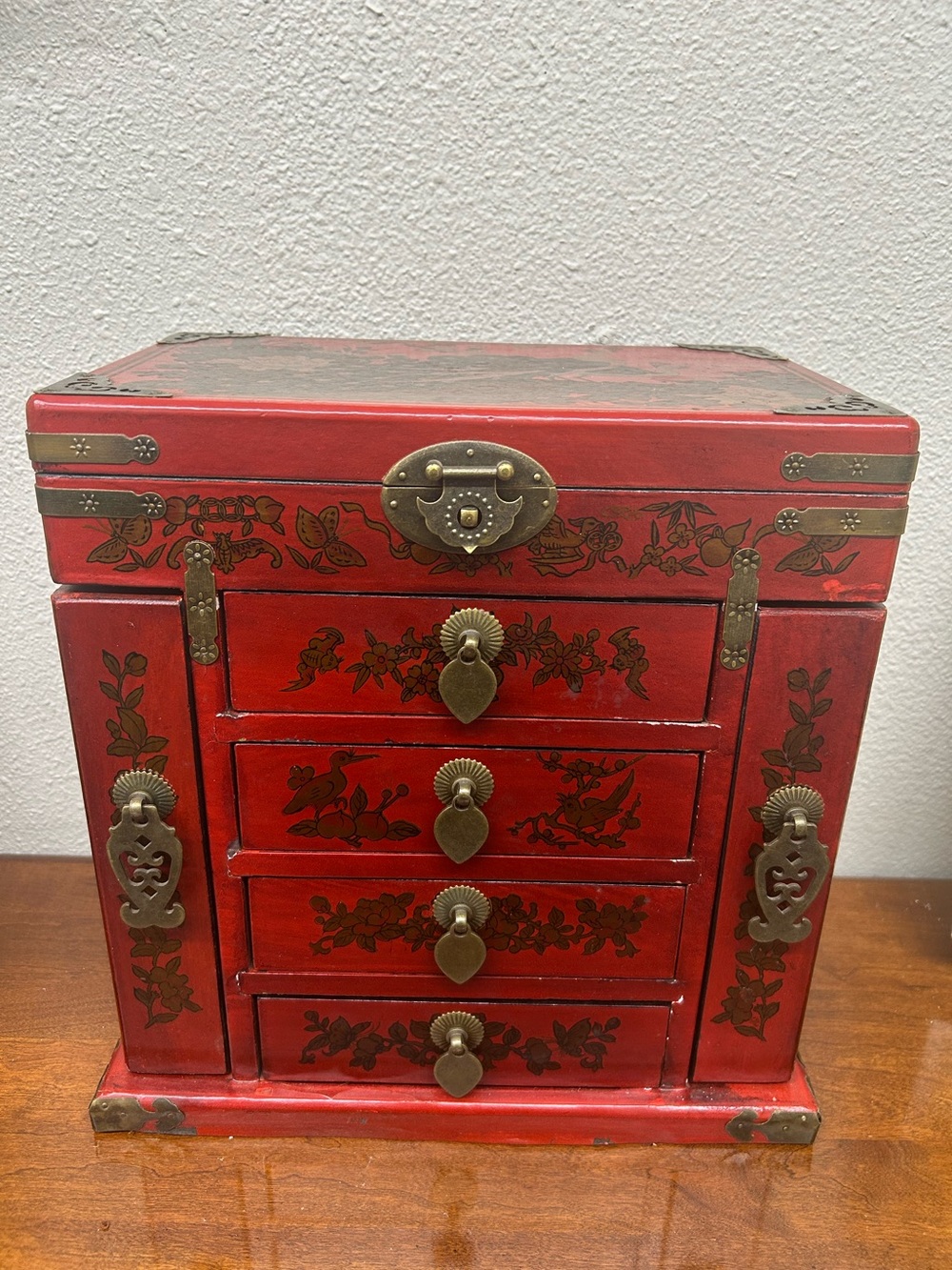vintage Chinese-style red lacquered wooden jewelry chest ornate brass-toned